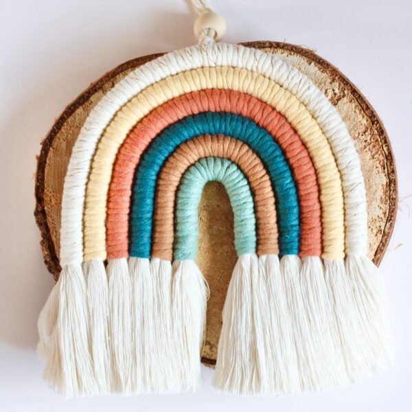 Handmade large 6-arch macramé rainbow in soft, neutral tones, displayed in a gift box